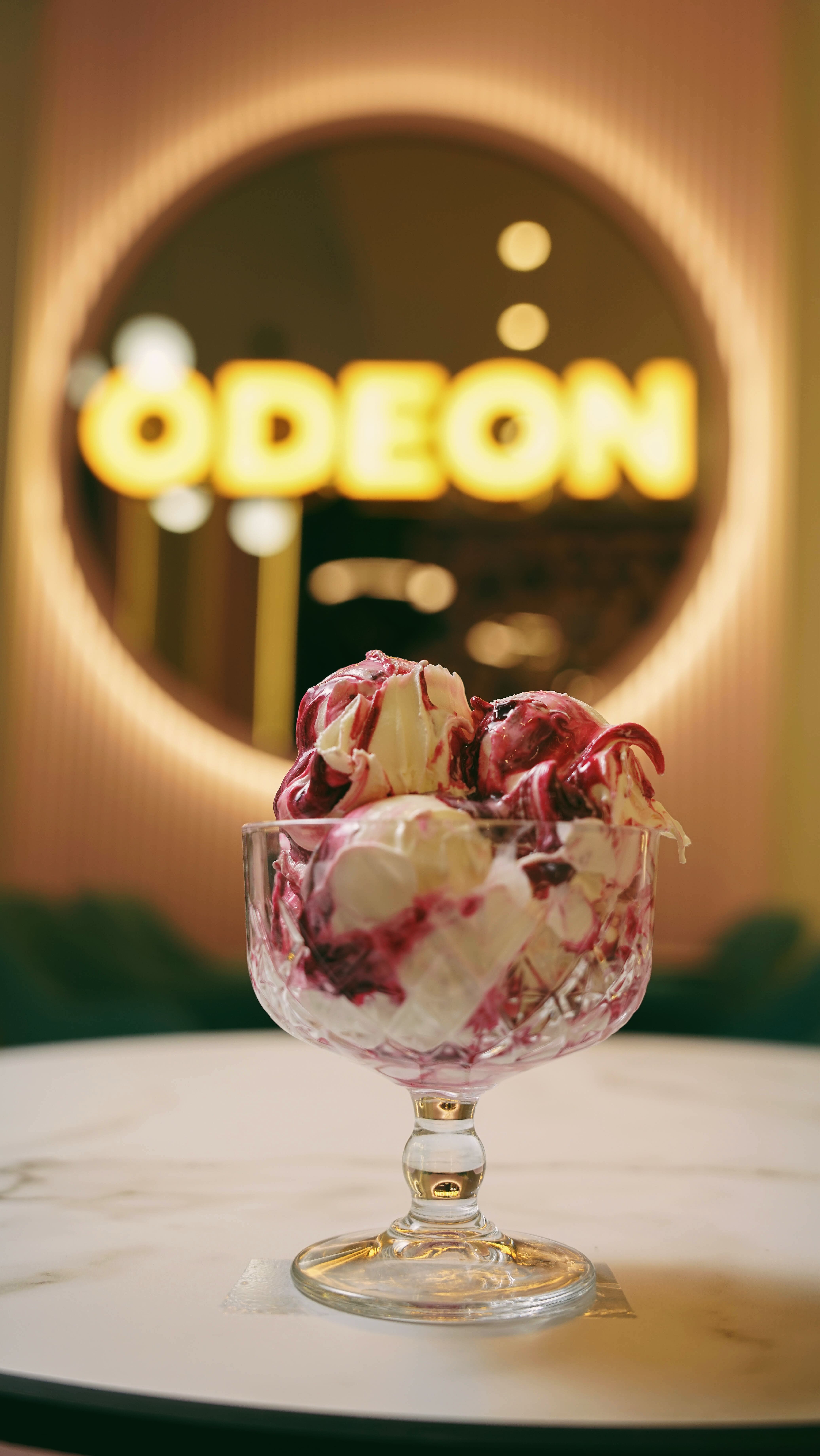 Yogurt Gelato with Odeon Sign in Background